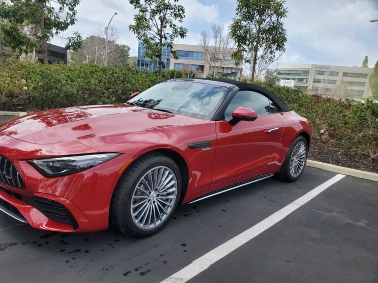 Red Mercedes-AMG convertible parked after detailing